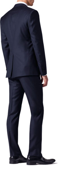 A rear profile of a navy INDOCHINO suit.
