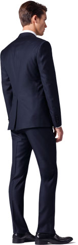 A rear profile of a navy INDOCHINO suit.